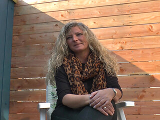 Busty Germans slut plays with a big orange dildo