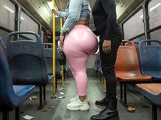 "Balaclava BBW Gets Ass  in Tight Shiny Pink Pants - Public Bus"
