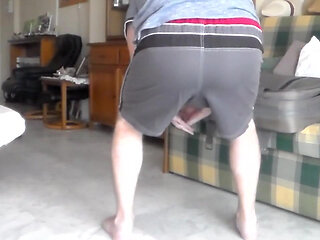 John is peeing all into his shorts