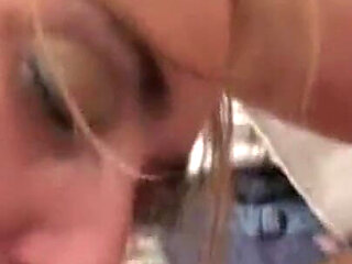 Blonde chick sucks his cock in close up
