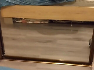 A Voyeuristic Stepmother in Tights Jerks off a Young Man and Receives His Sperm in Her Mouth.