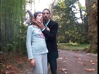 Two men dominating of a woman and a shemale
