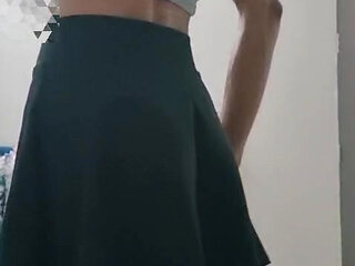 Skinny sissy boy masturbating in a skirt