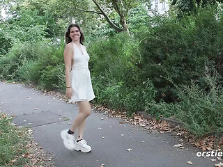 German amateur Kitty E gets horny and fingers her shaved pussy hardcore