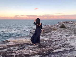 Sea Waves, Cliff and the Slut Young Woman