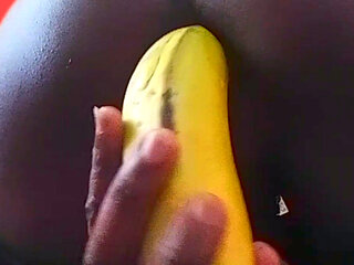 Young college twink inserted a huge banana in his asshole and spread his oiled ass