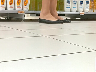 Footplay and Dipping in Black Flats at a Conad Store