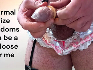 Sissy in satin panties compares penis size and small penis cums in condom. SPH feminization masturbate. Please humiliate.
