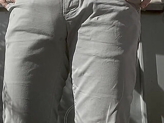 Jules Wets His Grey Pants and Exposes His Semi-hard Cock Through His Trousers