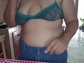 Mom in the kitchen in bralett