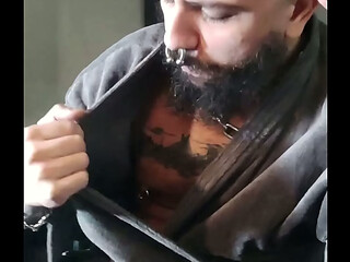 Tattoed daddy smoking a cigar in his smoky robes