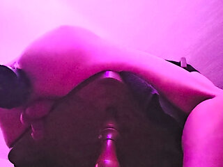 Crossdresser rides a toy