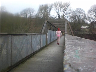 Tina walking the bridge