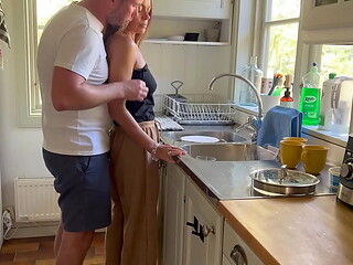 Doggy while doing the dishes