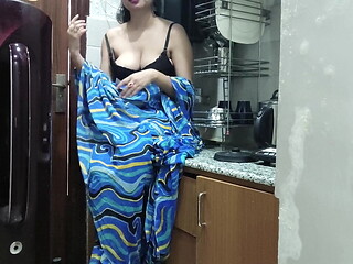 Indian stepmom watches and enters her stepson'_s Kitchen to fuck him