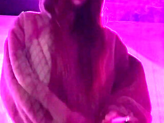 Smoking a Cigarette Outdoor While Wearing Only a Bikini and a Jacket