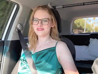 Sexy amateur Roni with glasses takes it all off in the car