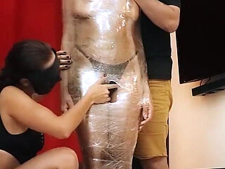 Mummifying Luana with Plastic Wrap and Foot Domination!