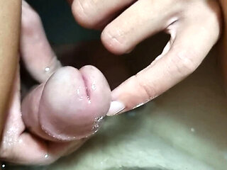 Polish amateur girl plays with her penis in bathtub, finger insertion in urethra