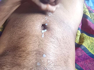 Ejaculating semen from a stiff, well-built Indian penis through masturbation