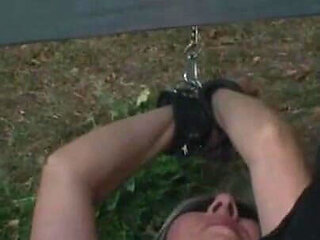 Humiliates stretching bottle in ass