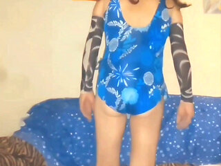 Posing in my gorgeous retro blue swimsuit in my white sandals and masturbating and coming onto my foot