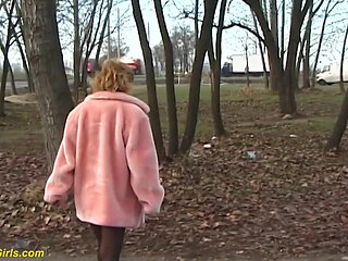 Redhead wife pissing in outdoor