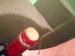 A full bottle of wine on a dick, a cool performance