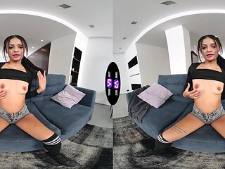A cute brunette girl, Breiny Zoe, plays with her pussy in vr shoes