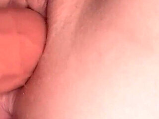 Naughty Blonde Fucks Herself with a Dildo in Intense Close-up