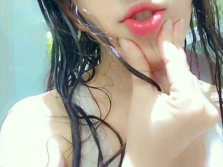 Naughty girl taking a hot shower and getting horny ending up masturbation at shower , mouth close up
