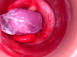 The camera inside the deep pussy records a huge ejaculation with a stuck condom