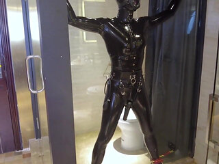 Mz20 - the Girl in Latex Clothing Locked in a Glass Room