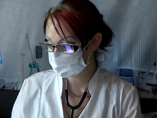 Doctor eating in medical mask and gloves