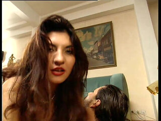 Omg! Busty Brunette in Latex Gets Fucked by Two Guys on Couch