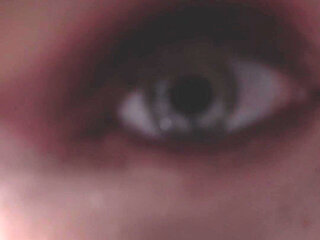 A Girl Is Messing with a Macro Camera