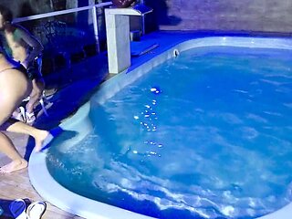 Caught in the act! Two brunettes get caught masturbating in the condo pool