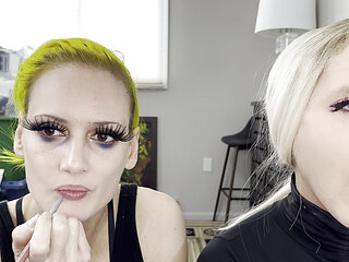 Man and Woman Putting on Lipliner and Lipstick