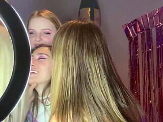 Blonde and brunette lesbians stripping and making out