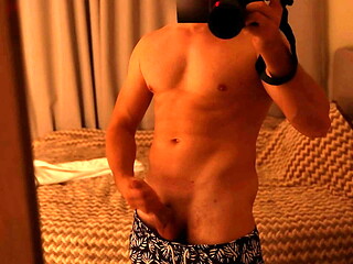 Fit guy couldn'_t resist jerking off in front of the mirror after visiting the pool