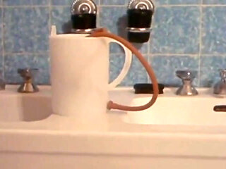 Maid's Steamy Enema Seduction with Fiery Redhead Teen