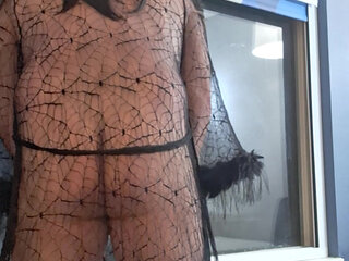 Nude under see thru robe,playing with myself in the window!
