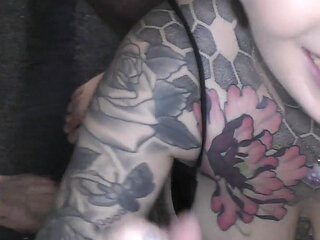 Hot Babe with an Amazing Tattoed Body Enters a Bukkake Party