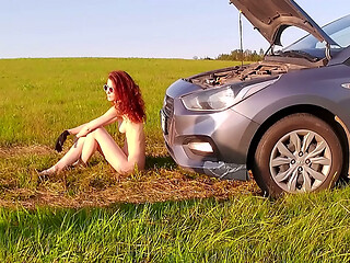 Red-haired beauty in the field