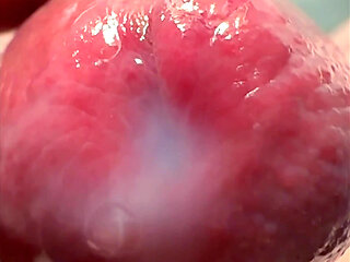 Macro Cum Shot. Ultra Close-up Ejaculation