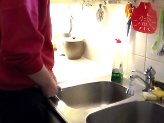 John Is Pissing in the Kitchen Sink