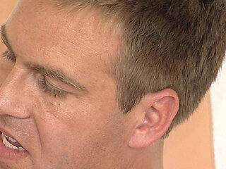 Skinny girl sucks cum off massive dicks after a gangbang