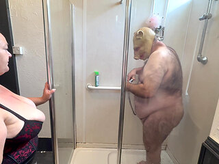 Domina Satana and Satana's piggy in the shower.