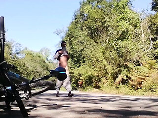 Young man playing with his bike with dildo in his ass