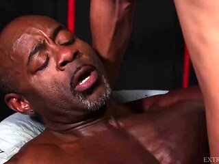 Asian lad with tattoos having sex with black stud